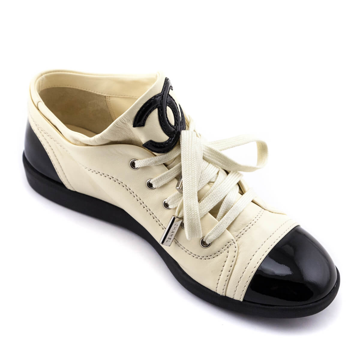 Chanel Cream 
Black Leather Cap Toe CC Sneakers Size US 7 | EU 37 - Replica Handbag 
 - Replica Handbags 
Best Quality
 Designer Handbags 
Preloved Fashions