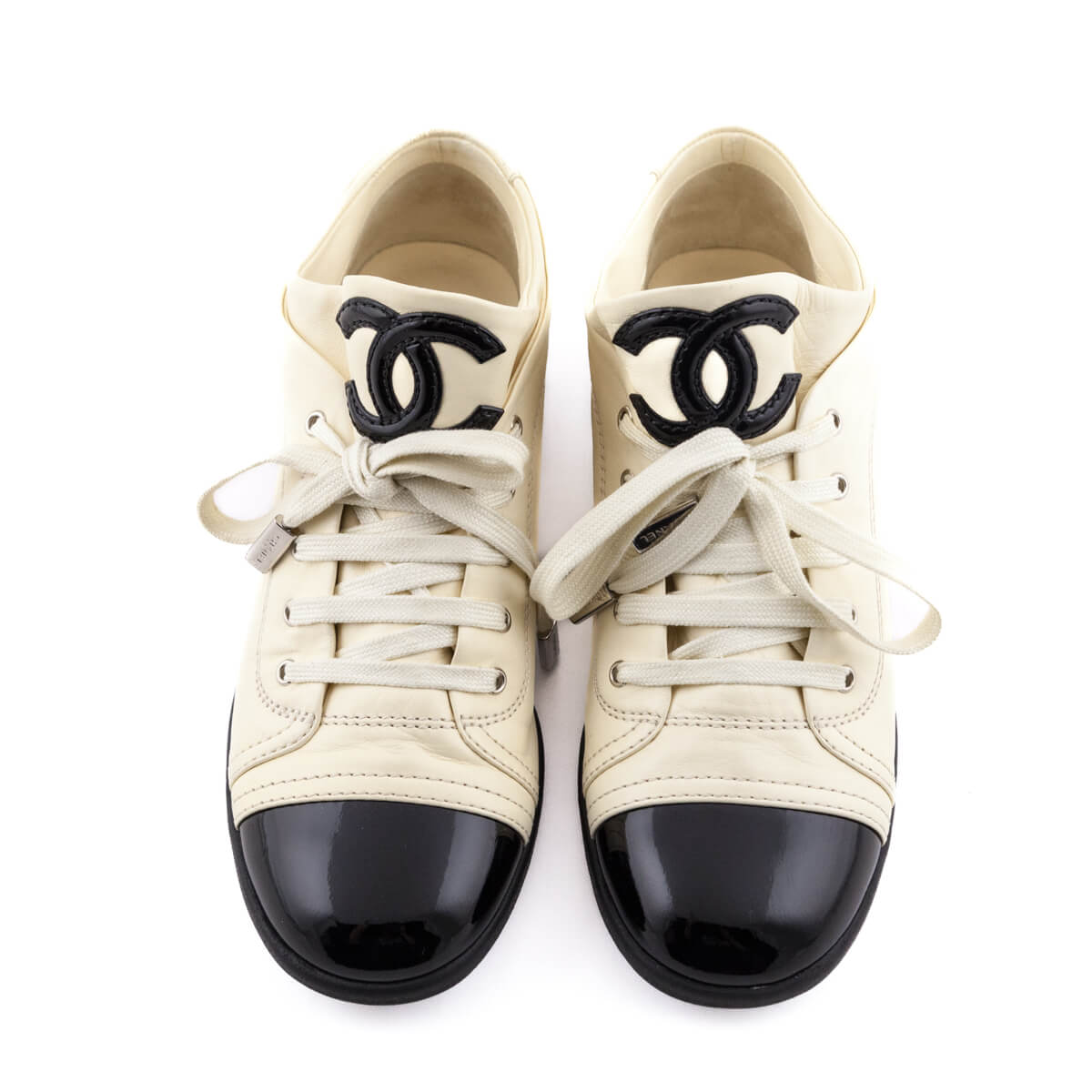 Chanel Cream 
Black Leather Cap Toe CC Sneakers Size US 7 | EU 37 - Replica Handbag 
 - Replica Handbags 
Best Quality
 Designer Handbags 
Preloved Fashions