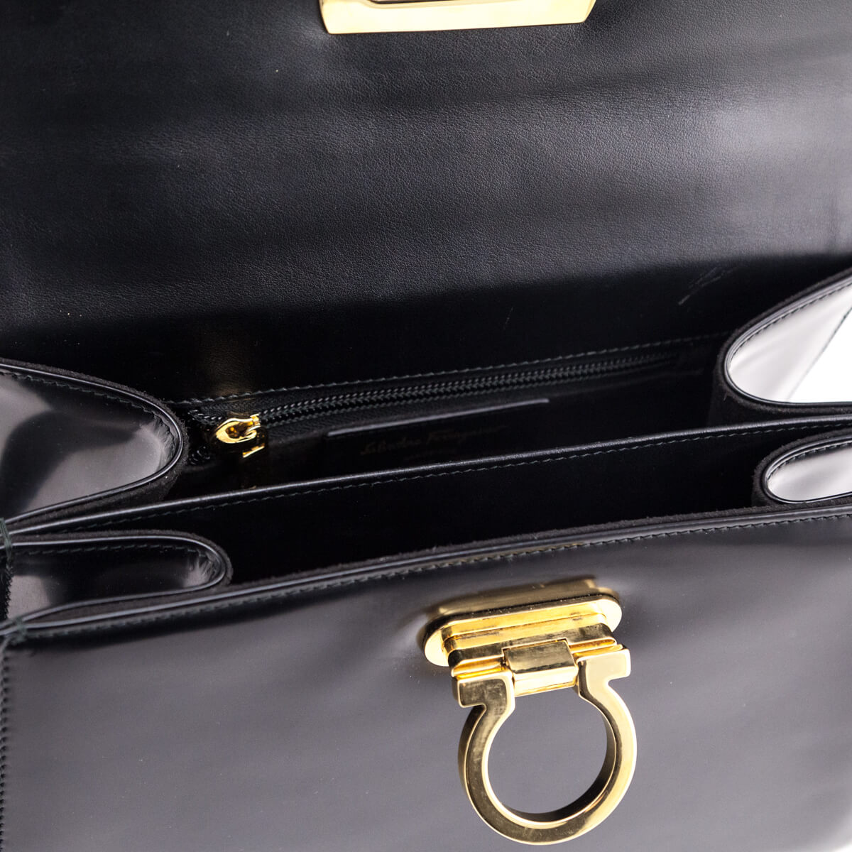 Ferragamo Shiny Black Brushed-Off Calfskin Medium Iconic Top Handle - Replica Handbag 
 - Replica Handbags 
Best Quality
 Designer Handbags 
Preloved Fashions