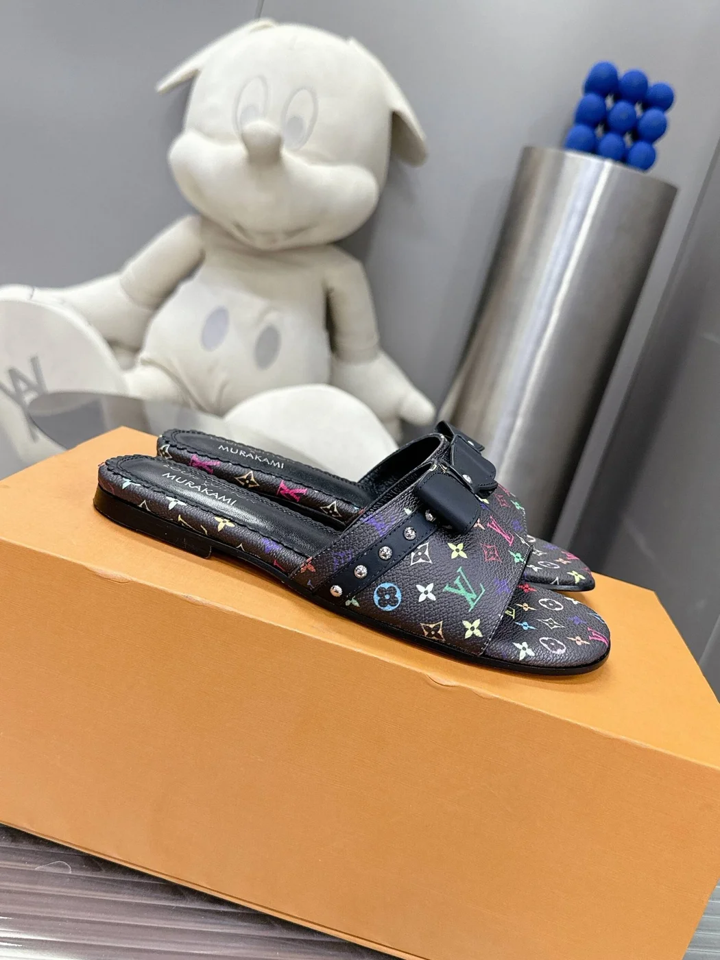 Louis Vuitton Women Black Patterned Leather Bow Slide Sandals product view 3