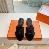 Hermès Women Black Embellished Leather Mules product view 1