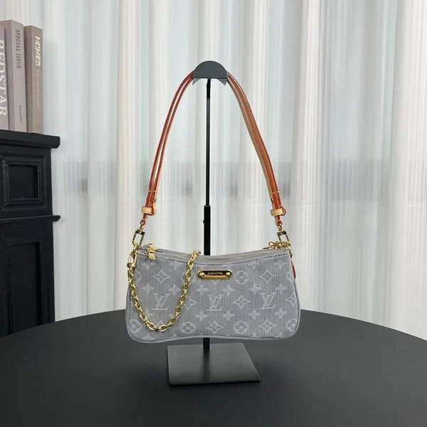 Louis Vuitton Liv Pochette in Washed Denim Bag product photo