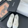 Chanel Women White Canvas Lace-Up Sneakers product view 1