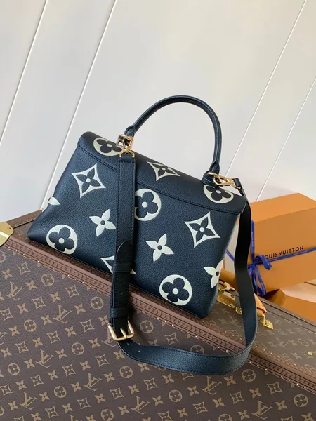 Louis Vuitton Madeleine 30 In Black Mix White Monogram Calfskin Embossed Logo Bag product view 3