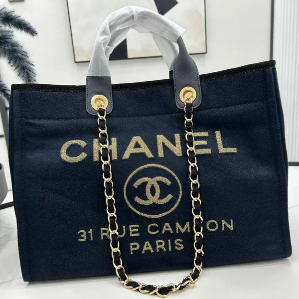 Chanel Deauville Large 38 Tote Bag In Black Canvas With Gold Embroidered Logo product photo