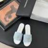 Chanel Women Light Blue Quilted Fabric Slides product view 1