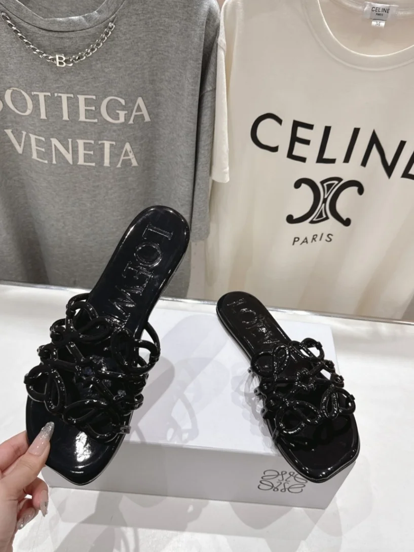 Loewe Leather Petal Anagram Slides in Black product view 1