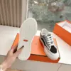 Hermès Women Black Blue Canvas And Leather Sneakers product view 2