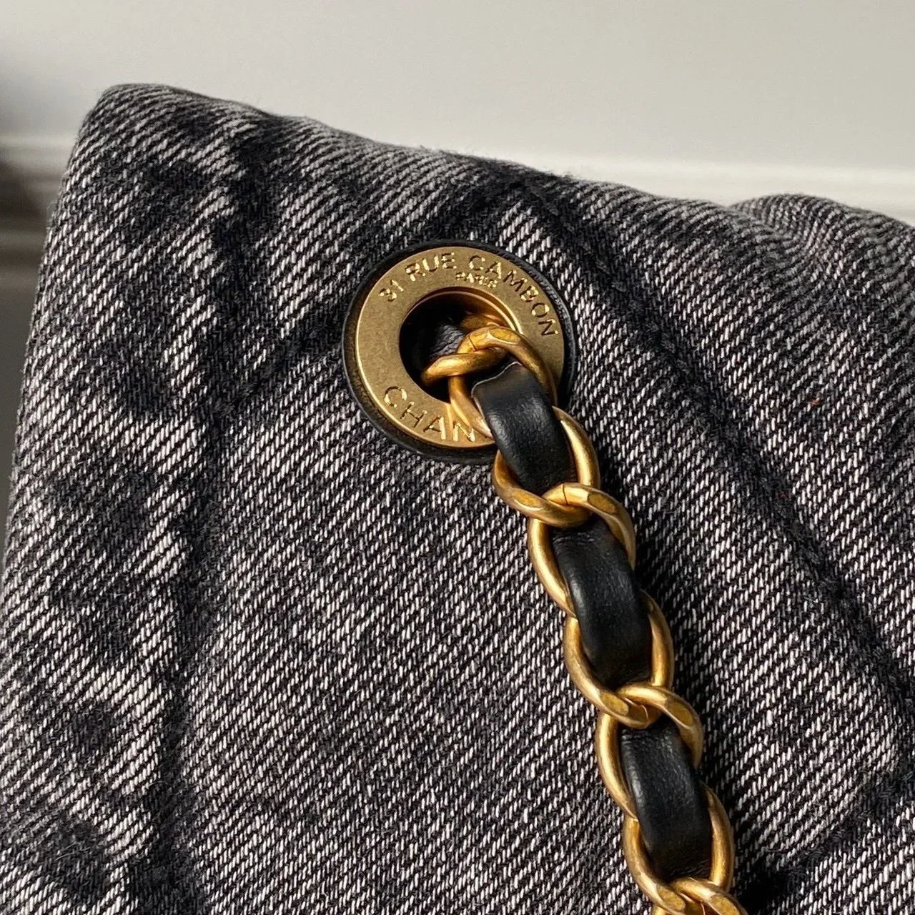 Chanel Maxi Flapbag in washed denim with gold-tone metal hardware Bag product view 2