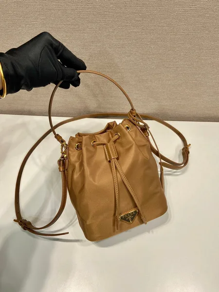 Prada Bucket Bag 19 In Russet Brown Re-Nylon And Calfskin Handle product view 2