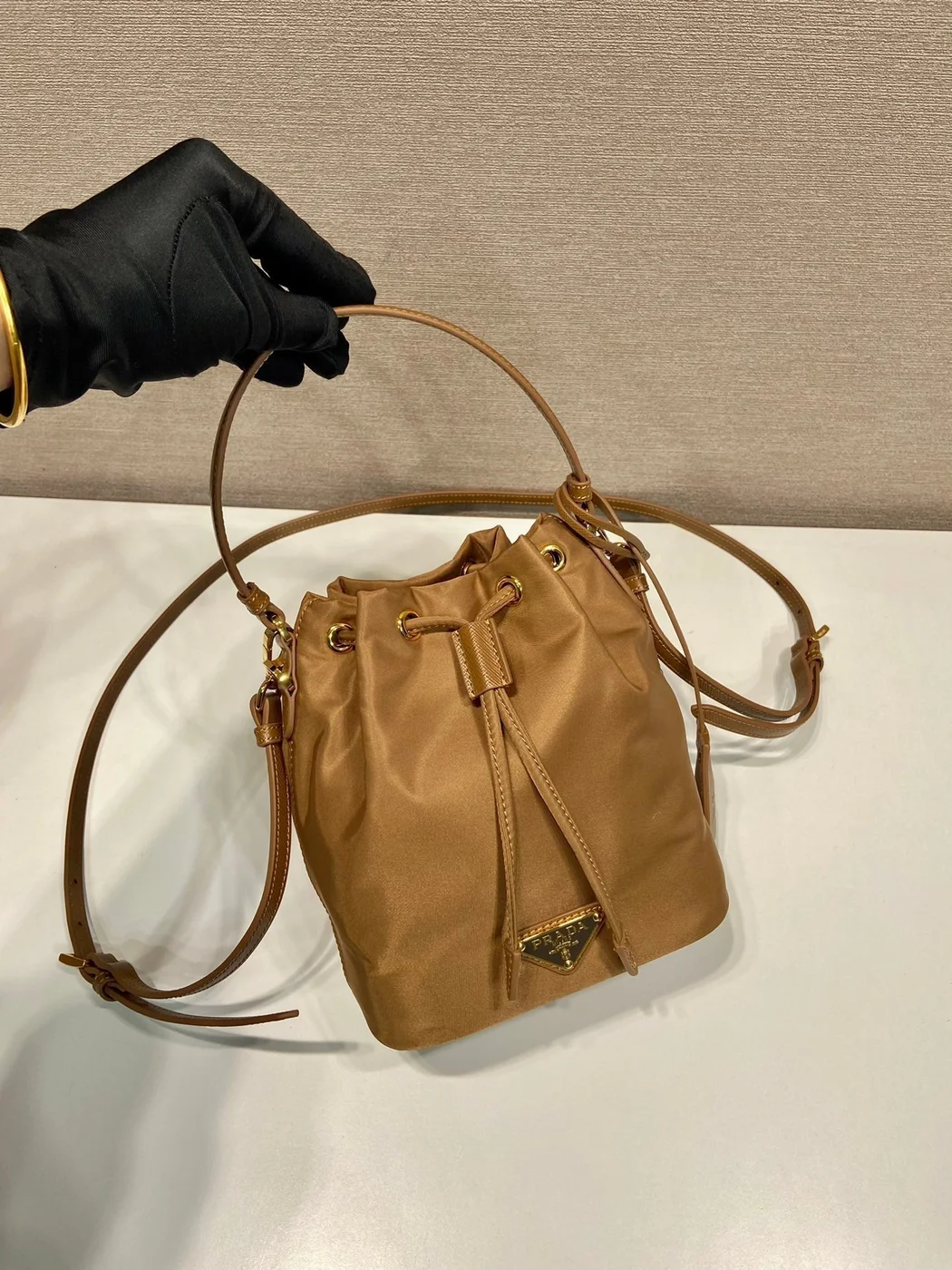 Prada Bucket Bag 19 In Russet Brown Re-Nylon And Calfskin Handle product view 2