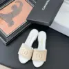 Chanel Women Beige Woven Fabric Slides product view 1