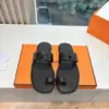 Hermès Women Black Leather Toe Loop Mules product view 1