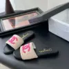 Chanel Women Black Leather And Beige Fabric Slides product view 5