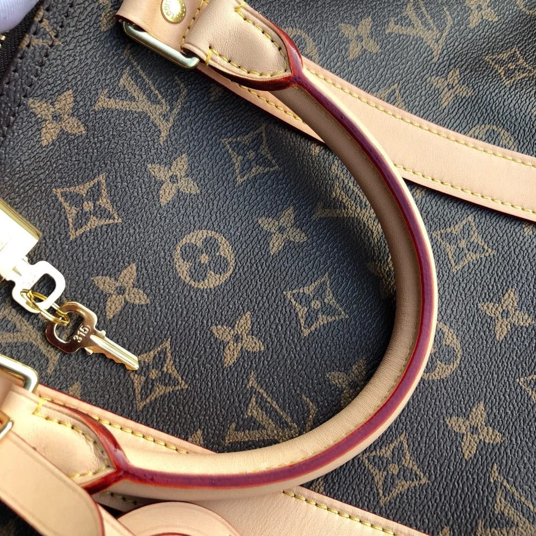 Louis Vuitton Monogram Canvas Keepall Bandoulière 55 Leather Duffle Bag product view 4