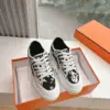 Hermès Women Black White Canvas Sneakers product view 1