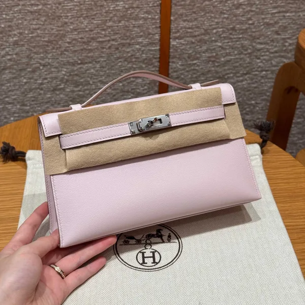 Hermès Kelly Pochette 22 In Light Pink Silver Hardware Bag product view 1