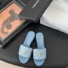 Chanel Women Light Blue Quilted Fabric Slides product view 1