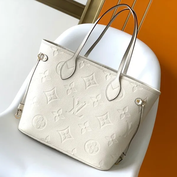 Louis Vuitton Neverfull MM White Monogram Empreinte Leather Bag product photo