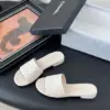 Chanel Women Cream Quilted Leather Slides product view 2