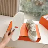 Hermès Women Beige Suede White Leather Sneakers product view 2