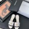 Chanel Women White Fabric Black Trim Slides product view 1