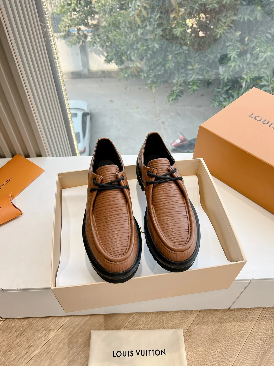 Louis Vuitton Women Brown Textured Leather Loafers product view 1
