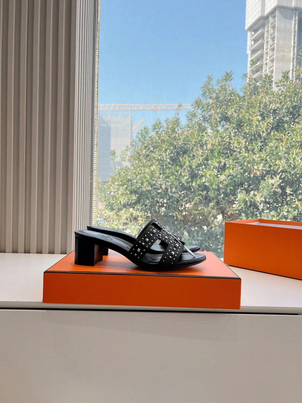 Hermès Women Black Leather Studded Mules product view 2