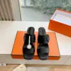 Hermès Women Black Leather Buckle Mules product view 1
