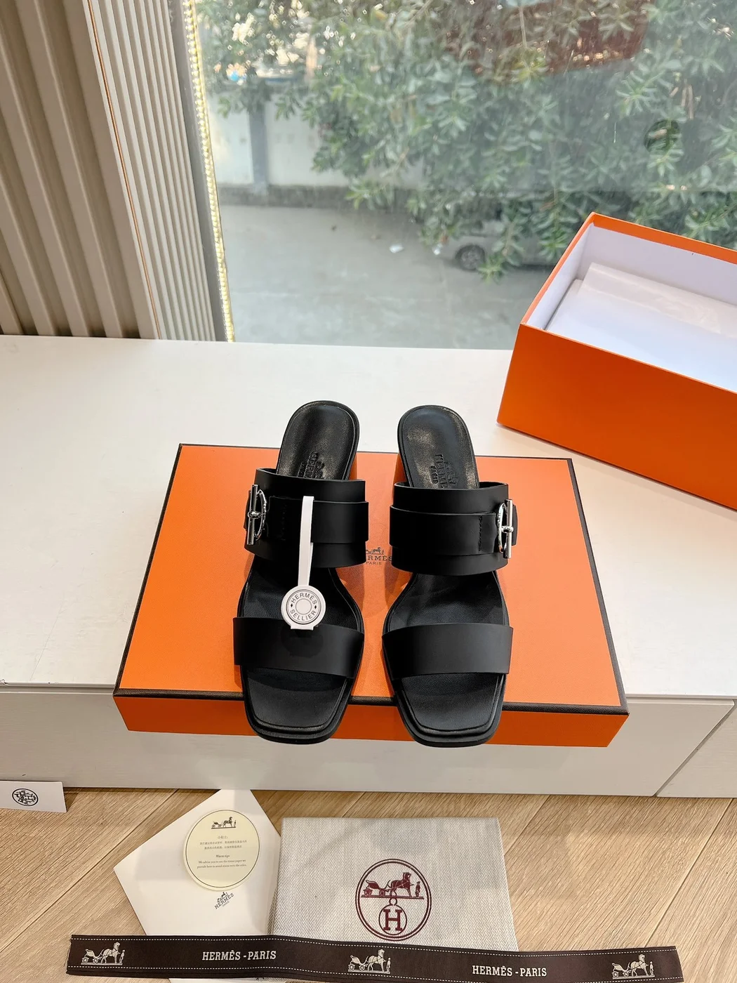 Hermès Women Black Leather Buckle Mules product view 1