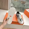 Hermès Women Black White Canvas Sneakers product view 2