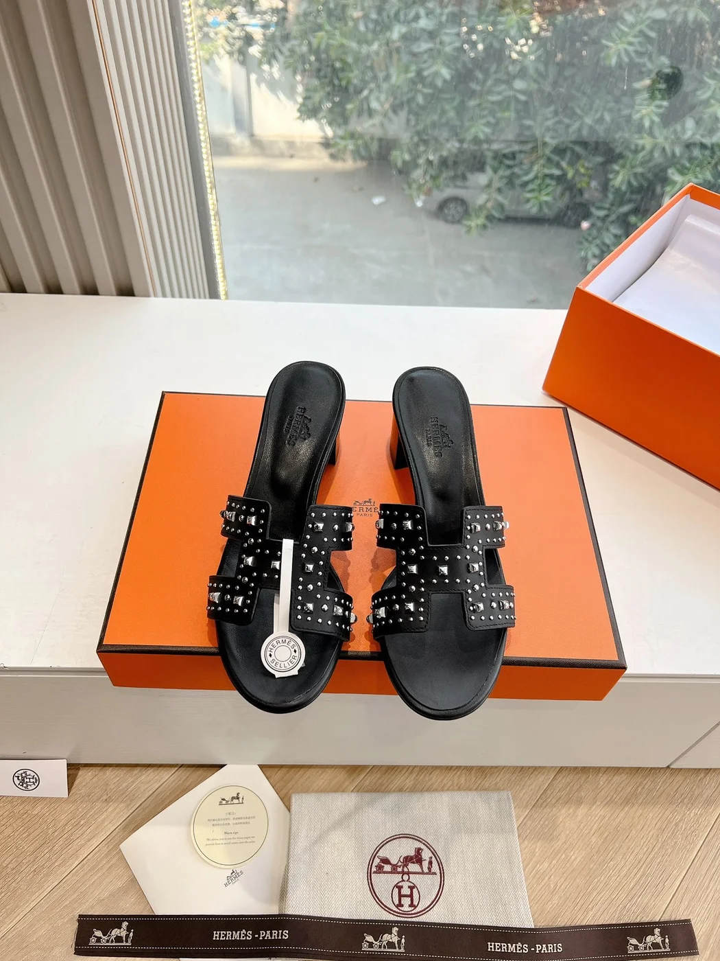 Hermès Women Black Leather Studded Mules product view 1