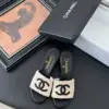 Chanel Women Beige Woven Fabric Black Leather Slides product view 1