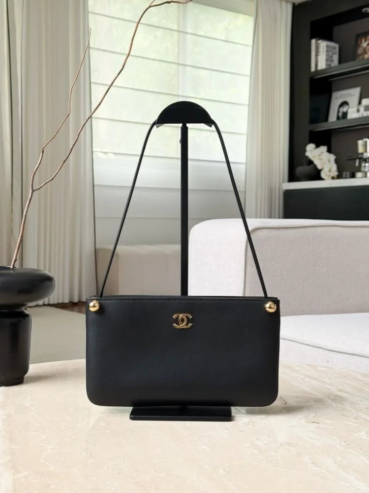 Chanel “Chic Studs” Clutch Bag Black Lambskin Gold Hardware product view 1