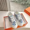 Hermès Women Light Blue Canvas And White Sneakers product view 1