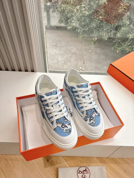 Hermès Women Light Blue Canvas And White Sneakers product view 1
