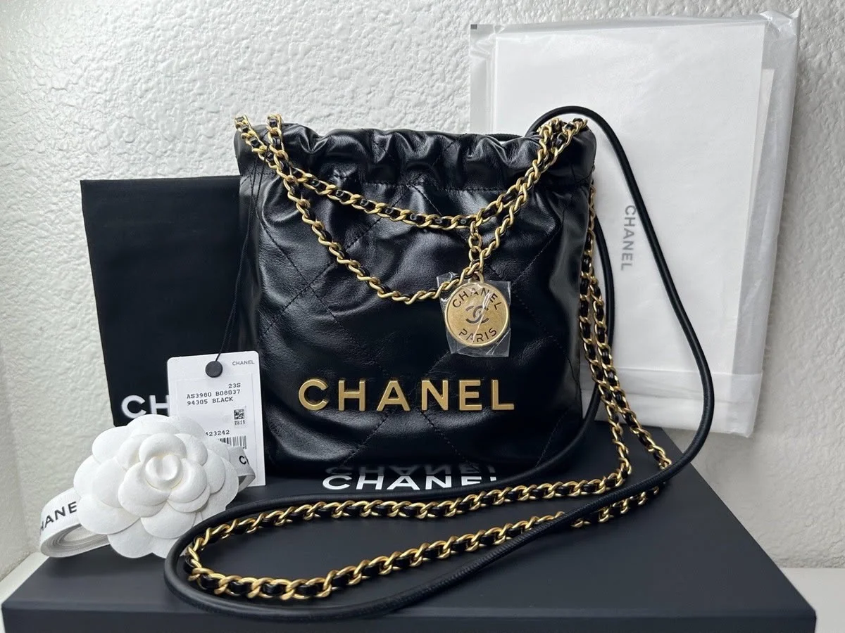 Chanel 22 Mini Hobo Handbag in Black Shiny Calfskin with Pearls product view 1