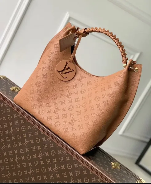 Louis Vuitton Carmel Mahina Leather Hobo Bag in Cognac product view 1