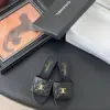 Chanel Women Black Quilted Leather Slides product view 1