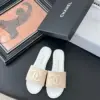 Chanel Women Beige Woven Fabric Slides product view 1