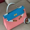 Hermès Kelly 28 Epsom Light Blue/ Electric Blue/Rose Pink Gold Hardware Bag product view 2