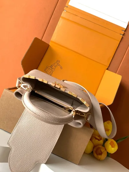 Louis Vuitton Capucines handbag in a beige product view 4
