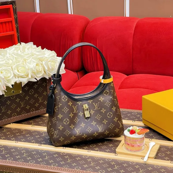 Louis Vuitton The Drop PM Handbag in Monogram Coated Canvas product view 1