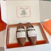 Hermès Women Brown White Leather Fringe Mules product view 3