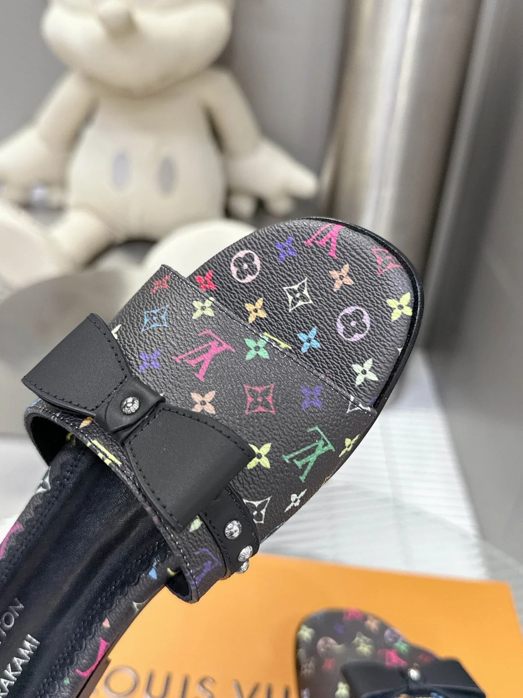 Louis Vuitton Women Black Patterned Leather Bow Slide Sandals product view 2