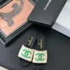 Chanel Women Beige Fabric Green Logo Slides product view 1