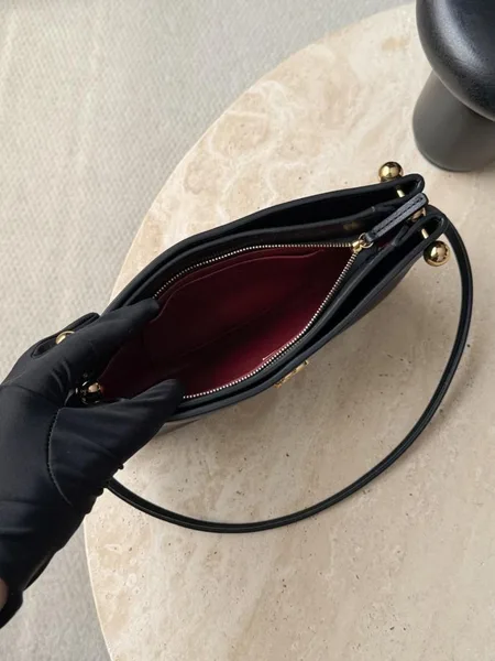 Chanel “Chic Studs” Clutch Bag Black Lambskin Gold Hardware product view 5
