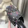 Louis Vuitton Women Black Patterned Leather Mules product view 2