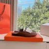 Hermès Women Brown White Leather Fringe Mules product view 2