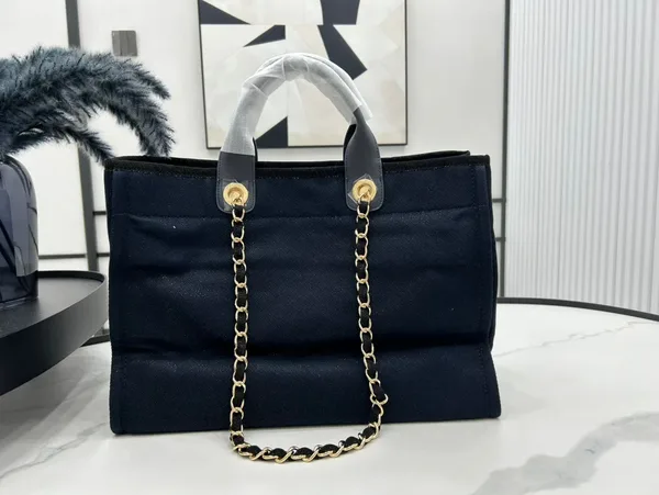 Chanel Deauville Large 38 Tote Bag In Black Canvas With Gold Embroidered Logo product view 5